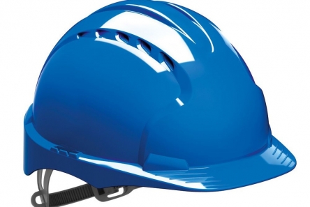 shell style helmet with ventilation holes and adjustable harness